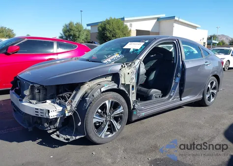 2017 Honda Civic Touring из США, поврежденный, VIN 2HGFC1F98HH659062